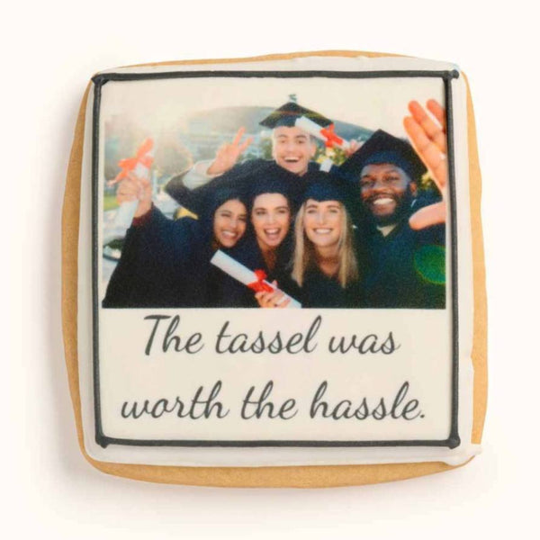 Customizable square sugar cookie featuring a printed personal graduation photo and custom text with hand-piped icing border