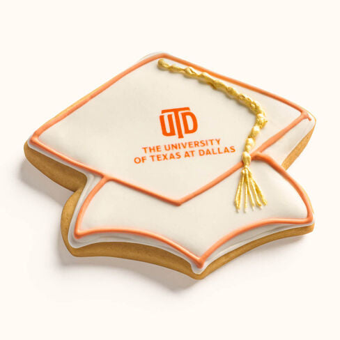 Customizable graduation cap cookie featuring printed school logo and hand-piped tassel in team colors Yellow