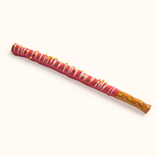 Customizable gourmet chocolate dipped pretzel rod with school color drizzle and decorative sprinkles for party favors.