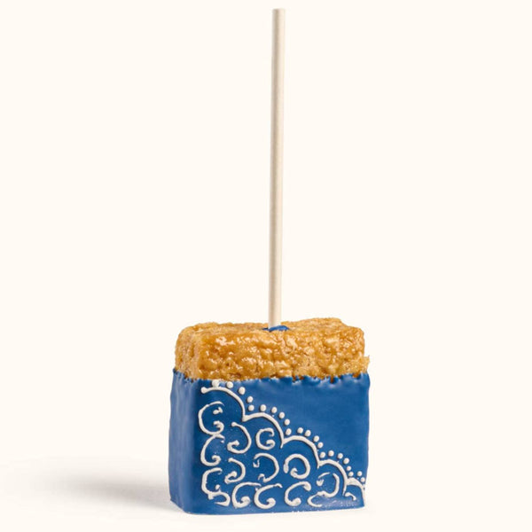 Customizable gourmet rice crispy treats with school color drizzle and decorative sprinkles for party favors